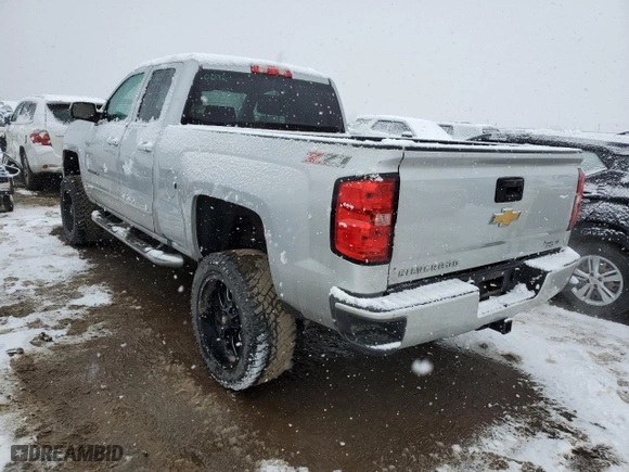 2016 Chevrolet Silverado 1500 LT with VIN 1GCVKREC3GZ199767, listed as a Copart auction lot 82165184 with 136,667 mi miles and Salvage Title. Bid and sale history available at carsss.com. Image 2.