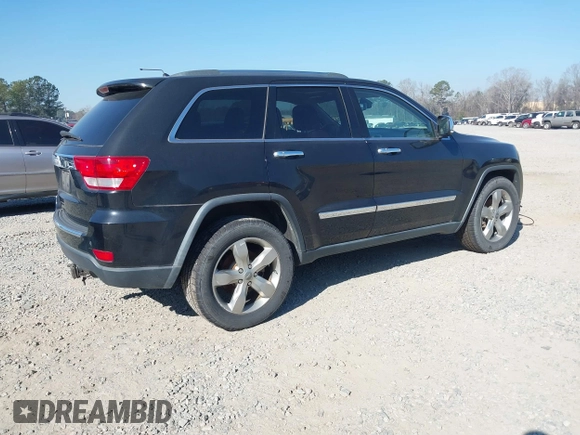 2013 Jeep Grand Cherokee Overland with VIN 1C4RJECG7DC644822, listed as a IAAI auction lot 41658872 with 156,838 mi miles. Bid and sale history available at carsss.com. Image 4.