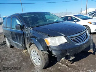 2014 Chrysler Town & Country Touring with VIN 2C4RC1BG0ER133675, listed as a IAAI auction lot 41895007 with 234,280 mi miles. Bid and sale history available at carsss.com. Image 1.
