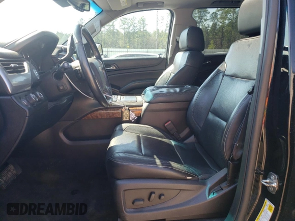 2015 Chevrolet Suburban LTZ with VIN 1GNSKKKC2FR210780, listed as a Copart auction lot 47207445 with 163,448 mi miles and Salvage Title. Bid and sale history available at carsss.com. Image 7.