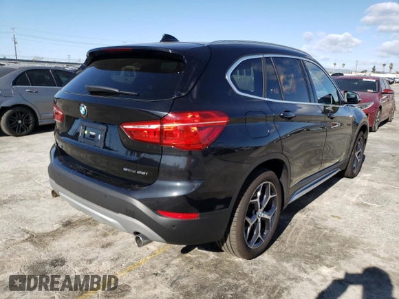 2019 BMW X1 sDrive28i with VIN WBXHU7C52K3H45282, listed as a Copart auction lot 42421563 with 8,057 mi miles. Bid and sale history available at carsss.com. Image 3.