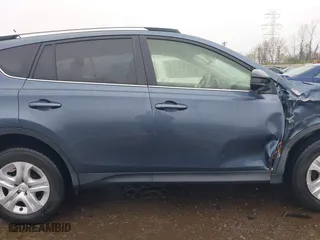2014 Toyota RAV4 LE with VIN JTMZFREV5ED036426, listed as a IAAI auction lot 41972556 with 84,944 mi miles. Bid and sale history available at carsss.com. Image 13.
