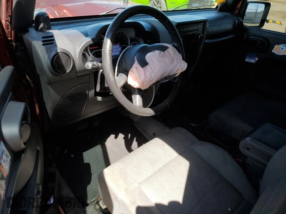 2007 Jeep Wrangler Sahara with VIN 1J4FA54167L163567, listed as a Copart auction lot 55229305 with 153,879 mi miles and Non repairable. Bid and sale history available at DreamBid. Image 8.