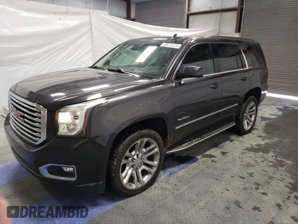 2018 GMC Yukon SLT with VIN 1GKS1BKCXJR293982, listed as a Copart auction lot 41860985 with 106,966 mi miles and Clean Title. Bid and sale history available at carsss.com. Image 1.