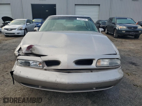 1997 Oldsmobile LSS z VIN 1G3HY52K9V4823565, wystawiony jako Copart lot #73965744 z przebiegiem 74 973 mil mil oraz Szkody całkowita. Historia ofert i sprzedaży dostępna na DreamBid. Obrazek 5.