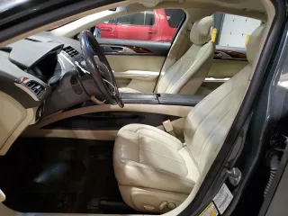 2015 Lincoln MKZ z VIN 3LN6L2J95FR613519, wystawiony jako Copart lot #59165895 z przebiegiem 117 630 mil mil oraz Szkoda całkowita • Salvage title. Historia ofert i sprzedaży dostępna na DreamBid. Obrazek 7.