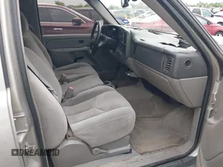 2005 Chevrolet Suburban LT with VIN 3GNEC16Z95G126134, listed as a IAAI auction lot 42048041 with 214,792 mi miles. Bid and sale history available at carsss.com. Image 5.