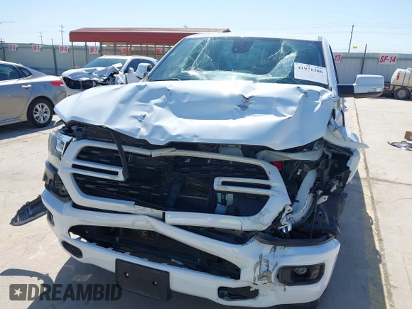 2022 Ram 1500 Big Horn with VIN 1C6RREBG5NN446070, listed as a IAAI auction lot 41971386 with 30,027 mi miles and . Bid and sale history available at DreamBid. Image 6.