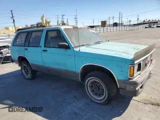 1991 GMC Jimmy z VIN 1GKCS13Z2M2518231, wystawiony jako Copart lot #64115274 z przebiegiem 132 698 mil mil oraz Czysty tytuł • Clean title. Historia ofert i sprzedaży dostępna na DreamBid. Obrazek 4.