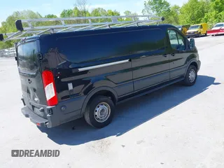 2015 Ford Transit Cargo z VIN 1FTBW2YG7FKA20201, wystawiony jako IAAI lot #42253463 z przebiegiem 83 235 mil mil oraz . Historia ofert i sprzedaży dostępna na DreamBid. Obrazek 4.