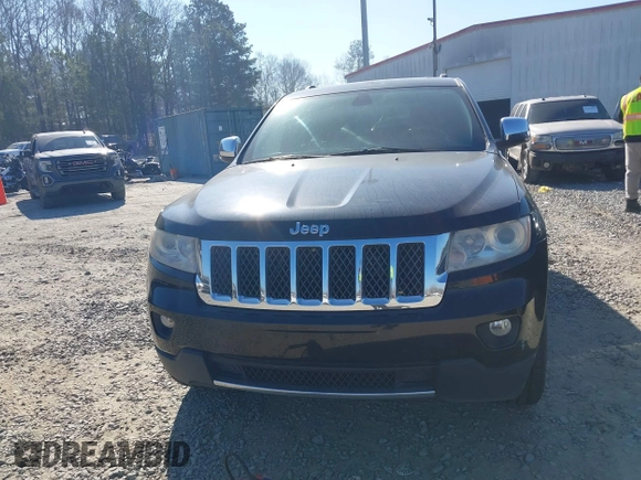 2013 Jeep Grand Cherokee Overland with VIN 1C4RJECG7DC644822, listed as a IAAI auction lot 41658872 with 156,838 mi miles. Bid and sale history available at carsss.com. Image 12.