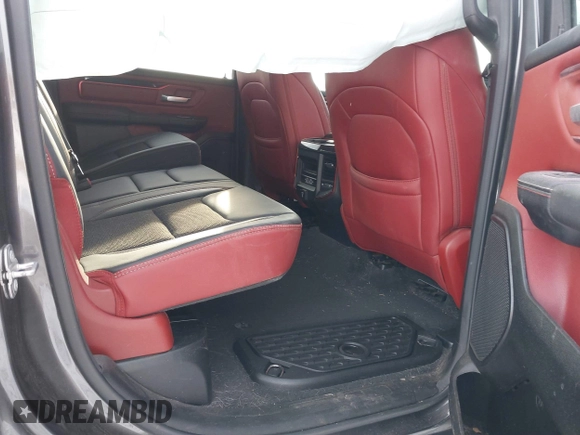 2022 Ram 1500 Rebel z VIN 1C6SRFLT9NN204868, wystawiony jako IAAI lot #41351273 z przebiegiem 67 120 mil mil oraz . Historia ofert i sprzedaży dostępna na DreamBid. Obrazek 8.