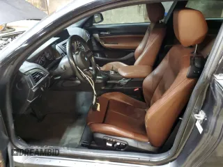 2016 BMW 2 Series M235i xDrive with VIN WBA1J9C51GV372003, listed as a Copart auction lot 83413884 with 104,951 mi miles and Salvage Title. Bid and sale history available at carsss.com. Image 7.