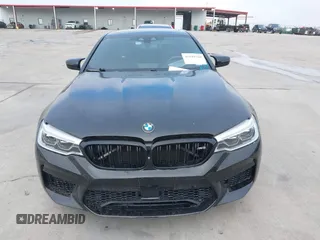 2019 BMW M5 z VIN WBSJF0C51KB447804, wystawiony jako IAAI lot #41848760 z przebiegiem 83 303 mil mil oraz . Historia ofert i sprzedaży dostępna na DreamBid. Obrazek 12.