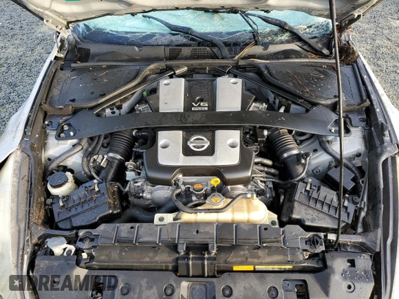 2012 Nissan 370Z Touring z VIN JN1AZ4FH5CM370505, wystawiony jako Copart lot #85255894 z przebiegiem Nie podano mil oraz Szkoda całkowita • Salvage title. Historia ofert i sprzedaży dostępna na DreamBid. Obrazek 11.