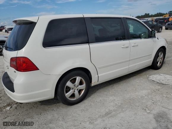 2010 Volkswagen Routan SE with VIN 2V4RW3D12AR295223, listed as a Copart auction lot 73876934 with 107,749 mi miles and Salvage Title. Bid and sale history available at carsss.com. Image 3.
