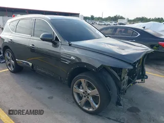 2024 Genesis GV80 z VIN KMUHCESC1RU174015, wystawiony jako IAAI lot #42275847 z przebiegiem 8 505 mil mil oraz . Historia ofert i sprzedaży dostępna na DreamBid. Obrazek 1.