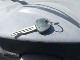2001 Hyundai Accent GLS z VIN KMHCG35C01U136132, wystawiony jako IAAI lot #42293830 z przebiegiem 111 906 mil mil oraz . Historia ofert i sprzedaży dostępna na DreamBid. Obrazek 11.