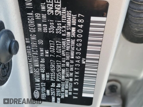 2012 Kia Sorento LX with VIN 5XYKT3A63CG300487, listed as a Copart auction lot 42238505 with 169,756 mi miles and Salvage Title. Bid and sale history available at DreamBid. Image 12.