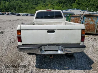 1999 Toyota Tacoma PreRunner with VIN 4TASN92NXXZ551335, listed as a Copart auction lot 62199645 with 198,754 mi miles and Salvage title. Bid and sale history available at DreamBid. Image 6.