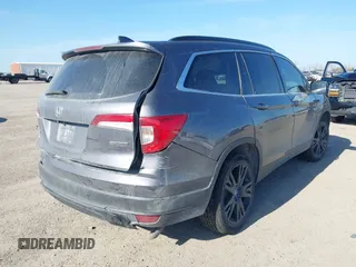 2021 Honda Pilot Special Edition with VIN 5FNYF5H27MB040801, listed as a IAAI auction lot 41656669 with 54,764 mi miles and . Bid and sale history available at DreamBid. Image 4.