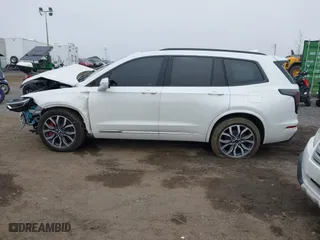 2023 Cadillac XT6 AWD Sport with VIN 1GYKPHRS1PZ155437, listed as a IAAI auction lot 41758495 with 22,949 mi miles. Bid and sale history available at carsss.com. Image 14.