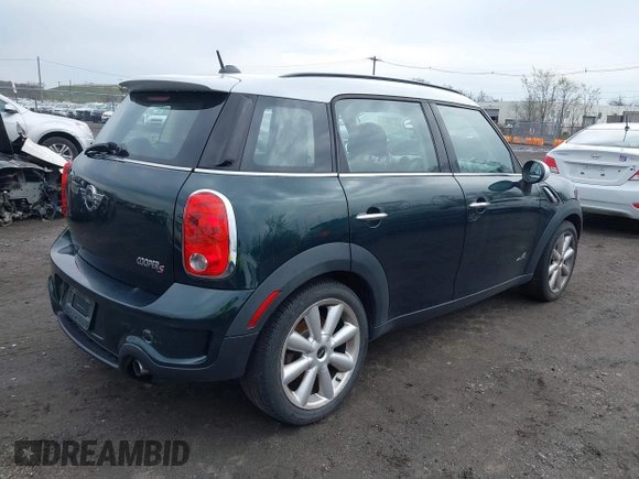 2011 MINI Countryman S with VIN WMWZC5C54BWL54135, listed as a IAAI auction lot 42034897 with 130,082 mi miles and . Bid and sale history available at DreamBid. Image 4.