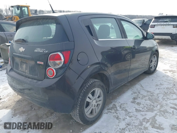 2014 Chevrolet Sonic LT with VIN 1G1JC6SB3E4219055, listed as a IAAI auction lot 41411713 with 76,047 mi miles. Bid and sale history available at carsss.com. Image 4.