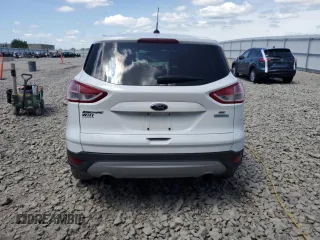 2013 Ford Escape SE with VIN 1FMCU0G98DUA98873, listed as a Copart auction lot 61253725 with 140,534 mi miles and Clean title. Bid and sale history available at DreamBid. Image 6.