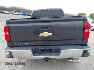 2015 Chevrolet Silverado 1500 LT with VIN 1GCVKREC5FZ224506, listed as a IAAI auction lot 41780803 with 104,960 mi miles and . Bid and sale history available at DreamBid. Image 16.
