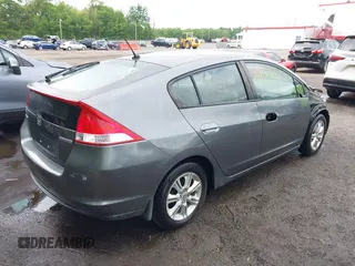 2010 Honda Insight EX with VIN JHMZE2H73AS025856, listed as a IAAI auction lot 42183307 with 71,564 mi miles and . Bid and sale history available at DreamBid. Image 4.