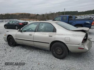 1996 Honda Accord with VIN 1HGCE6647TA010021, listed as a Copart auction lot 86294974 with 162,400 mi miles and Salvage title. Bid and sale history available at DreamBid. Image 2.