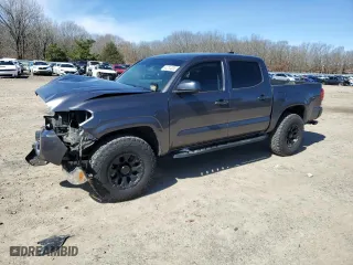 2021 Toyota Tacoma 4WD SR with VIN 5TFCZ5AN6MX252195, listed as a Copart auction lot 48234085 with 56,983 mi miles and Salvage Title. Bid and sale history available at carsss.com. Image 1.