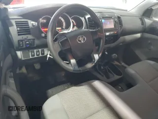2013 Toyota Tacoma z VIN 5TFPX4EN6DX015170, wystawiony jako Copart lot #50858535 z przebiegiem 144 378 mil mil oraz Szkoda całkowita • Salvage title. Historia ofert i sprzedaży dostępna na DreamBid. Obrazek 8.