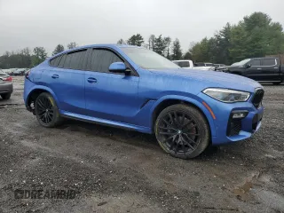 2020 BMW X6 M50i with VIN 5UXCY8C07L9B45473, listed as a Copart auction lot 73403164 with 0 mi miles and Salvage Title. Bid and sale history available at carsss.com. Image 4.