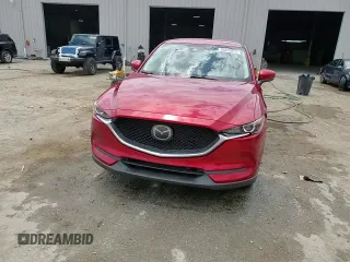 2019 Mazda CX-5 Sport with VIN JM3KFABM5K1597891, listed as a Copart auction lot 55020815 with 100,454 mi miles and Non Repairable. Bid and sale history available at DreamBid. Image 15.