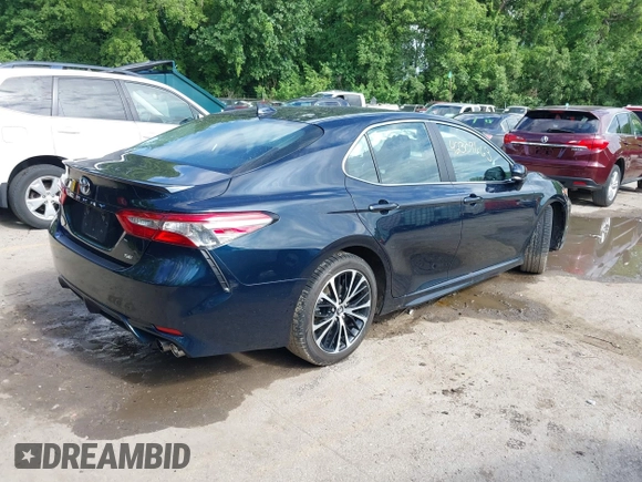2018 Toyota Camry LE with VIN 4T1B11HK2JU579550, listed as a IAAI auction lot 42309663 with 40,868 mi miles and . Bid and sale history available at DreamBid. Image 4.