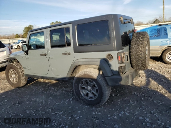 2015 Jeep Wrangler Unlimited Rubicon with VIN 1C4BJWFG7FL732694, listed as a Copart auction lot 42977435 with 128,759 mi miles and Salvage Title. Bid and sale history available at carsss.com. Image 2.