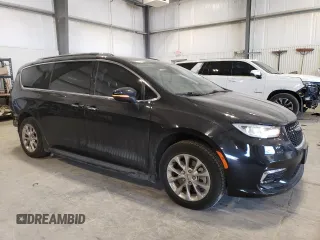 2021 Chrysler Pacifica Touring L with VIN 2C4RC3BG4MR573571, listed as a Copart auction lot 89388215 with 50,969 mi miles and Salvage title. Bid and sale history available at DreamBid. Image 4.