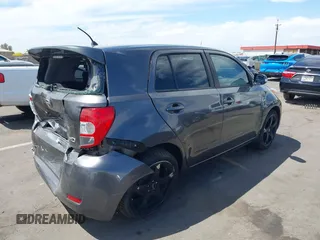 2008 Scion xD with VIN JTKKU10498J025371, listed as a IAAI auction lot 42018309 with 90,192 mi miles. Bid and sale history available at carsss.com. Image 4.