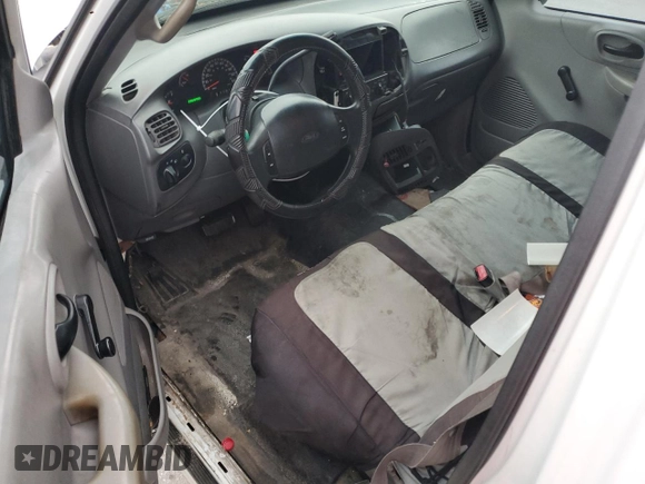 2000 Ford F-150 XL с VIN 1FTZX1725YNB58607, выставлен на аукционе Copart как лот 48706575 с пробегом 286 898 миль миль и Списание • Salvage title. История ставок и продаж доступна на DreamBid. Изображение 8.