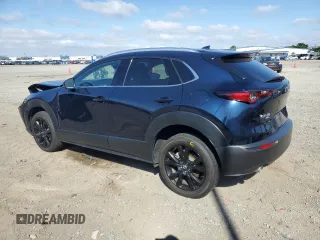 2023 Mazda CX-30 S Premium with VIN 3MVDMBDM7PM543849, listed as a Copart auction lot 54852415 with 20,898 mi miles and Salvage title. Bid and sale history available at DreamBid. Image 2.