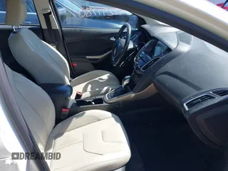 2018 Ford Focus Titanium with VIN 1FADP3N24JL279449, listed as a IAAI auction lot 42297780 with 144,479 mi miles and . Bid and sale history available at DreamBid. Image 5.