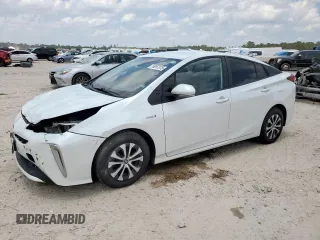 2022 Toyota Prius LE z VIN JTDL9MFU9N3034254, wystawiony jako Copart lot #56957375 z przebiegiem 83 463 mil mil oraz Szkoda całkowita • Salvage title. Historia ofert i sprzedaży dostępna na DreamBid. Obrazek 1.