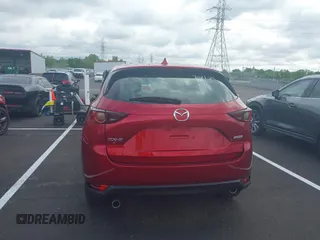 2019 Mazda CX-5 Sport with VIN JM3KFABM5K0627087, listed as a IAAI auction lot 42163866 with 38,050 mi miles and . Bid and sale history available at DreamBid. Image 16.