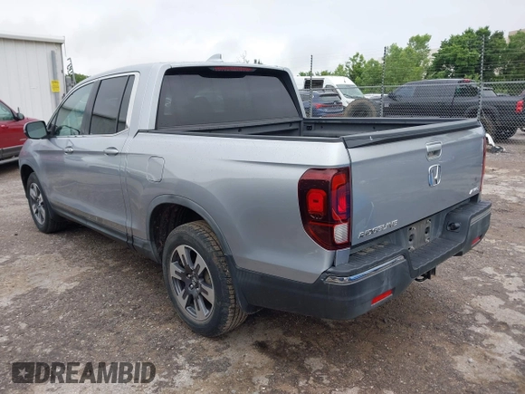 2018 Honda Ridgeline RTL with VIN 5FPYK3F52JB002649, listed as a IAAI auction lot 42338360 with 68,802 mi miles and . Bid and sale history available at DreamBid. Image 3.