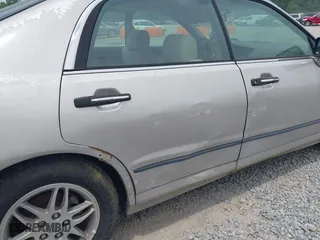 2002 Mitsubishi Diamante LS with VIN 6MMAP57P52T010479, listed as a IAAI auction lot 42086895 with 89,977 mi miles. Bid and sale history available at carsss.com. Image 6.