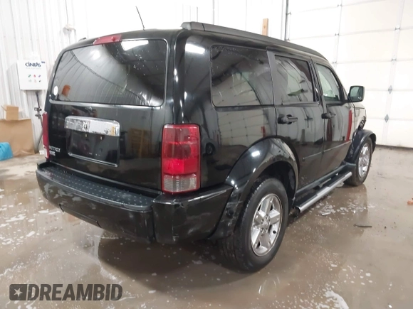 2007 Dodge Nitro SLT with VIN 1D8GT58K77W724530, listed as a IAAI auction lot 41499022 with 214,183 mi miles. Bid and sale history available at carsss.com. Image 4.
