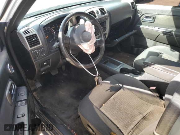 2009 GMC Canyon Work Truck with VIN 1GTDT19E698142512, listed as a Copart auction lot 77493574 with 0 mi miles and Salvage Title. Bid and sale history available at carsss.com. Image 8.