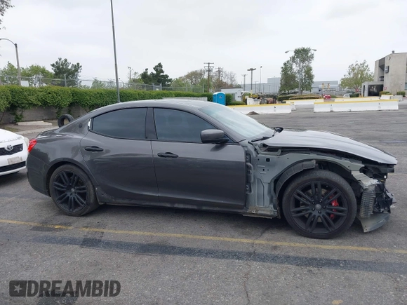 2016 Maserati Ghibli S Q4 with VIN ZAM57RTA0G1177125, listed as a IAAI auction lot 42073335 with 114,663 mi miles and . Bid and sale history available at DreamBid. Image 14.